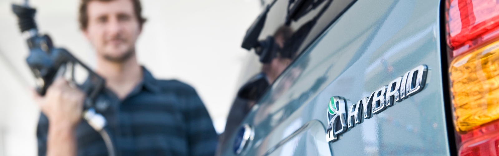 Man charging a hybrid