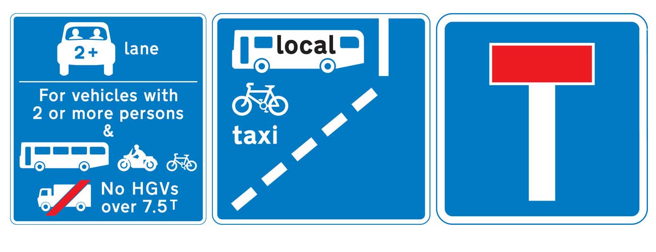 blue information road signs in built up areas
