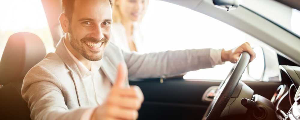 happy-driver-for-first-company-car